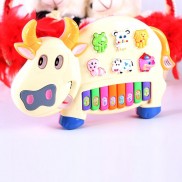 Đồ chơi đàn piano hình chú bò sữa cho bé xanh