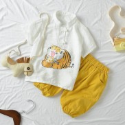 Bộ đồ chất liệu đũi áo polo cộc tay quần bo gấu họa tiết hổ liếm dễ thương cho bé - MAGICKIDS